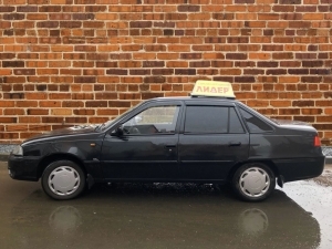 Автомобиль инструктора Daewoo Nexia